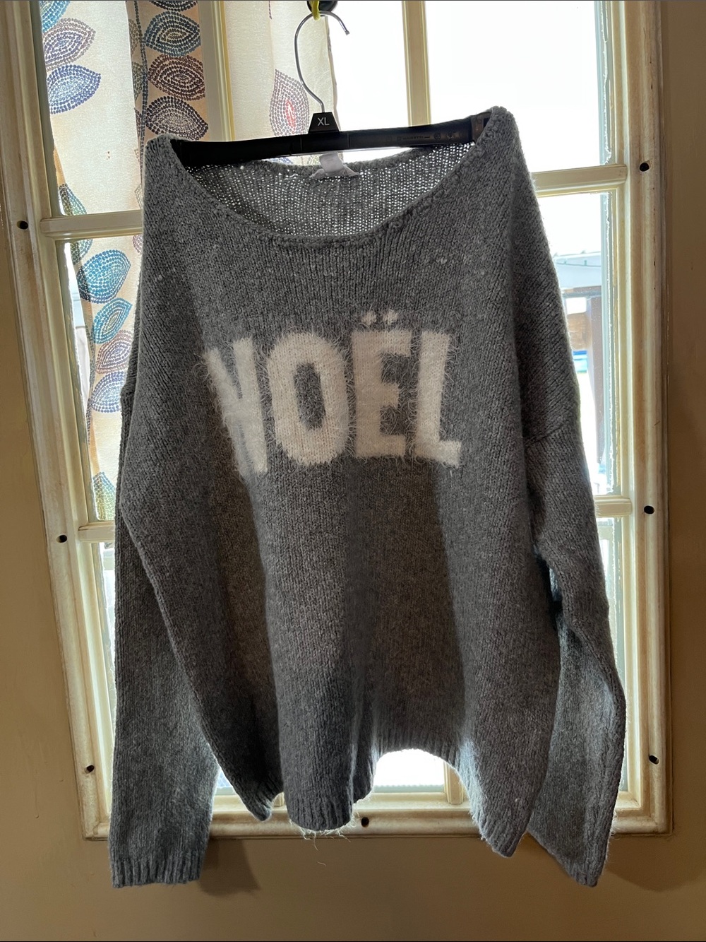 Tribal Gray Crewneck Sweater with White "NOËL" Graphic